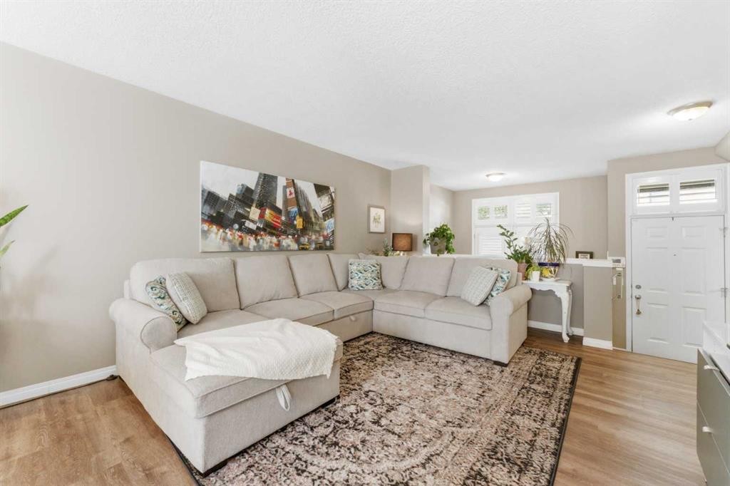 159 Mckenzie Towne Gate Se, Calgary, AB - Indoor Photo Showing Living Room