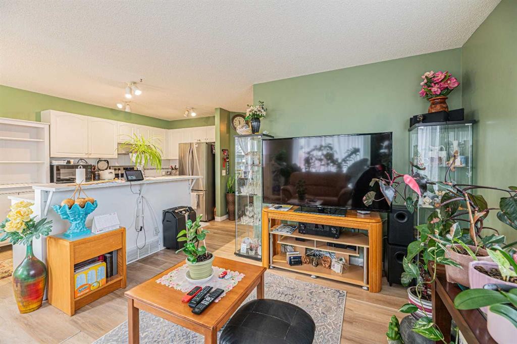 18 Coral Springs Circle Ne, Calgary, AB - Indoor Photo Showing Living Room With Fireplace