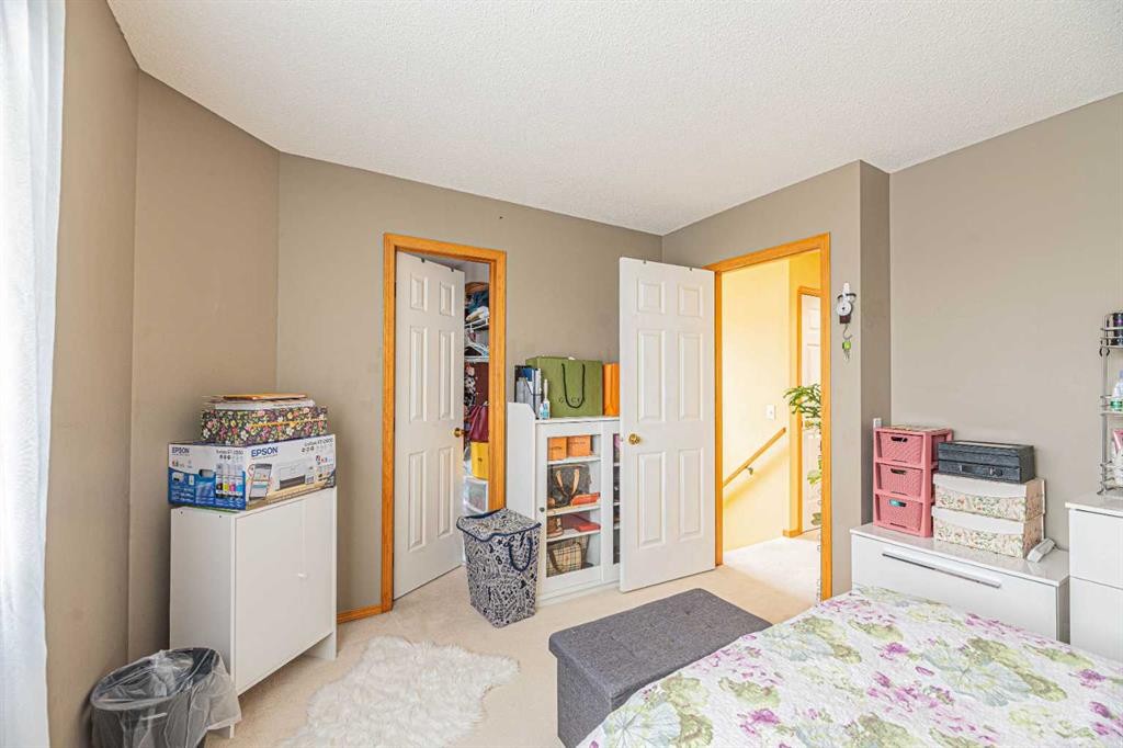 18 Coral Springs Circle Ne, Calgary, AB - Indoor Photo Showing Bedroom