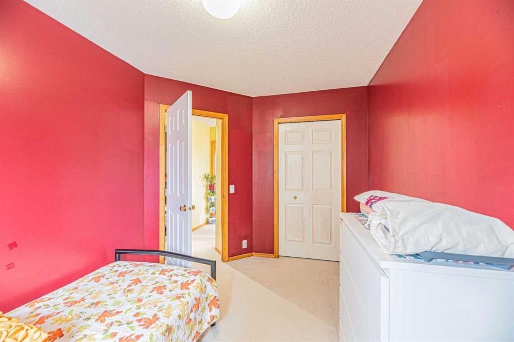 18 Coral Springs Circle Ne, Calgary, AB - Indoor Photo Showing Bedroom