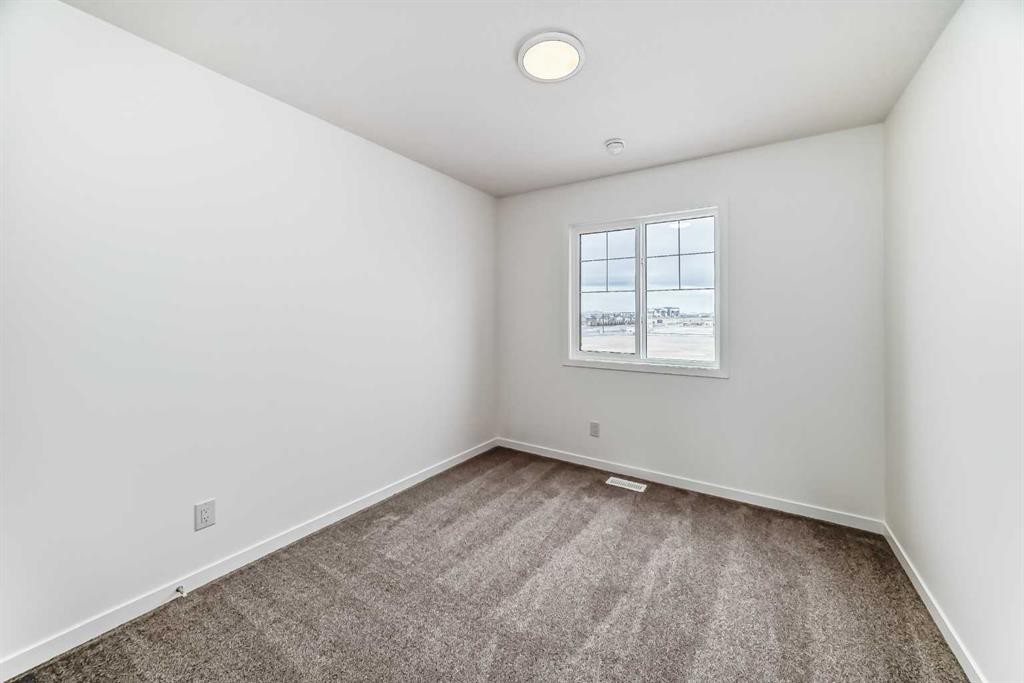 36 Mercado Road Se, Calgary, AB - Indoor Photo Showing Other Room