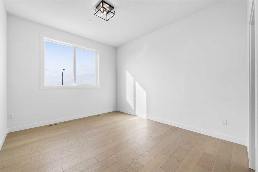19 Wolf Crescent, Okotoks, AB - Indoor Photo Showing Other Room