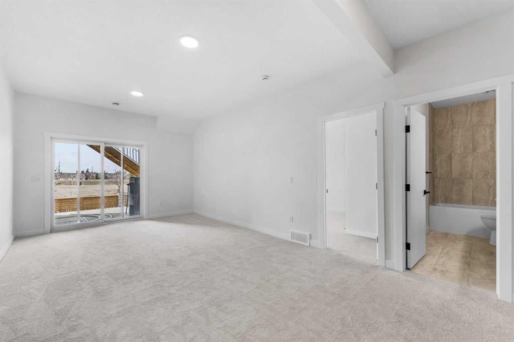 19 Wolf Crescent, Okotoks, AB - Indoor Photo Showing Other Room