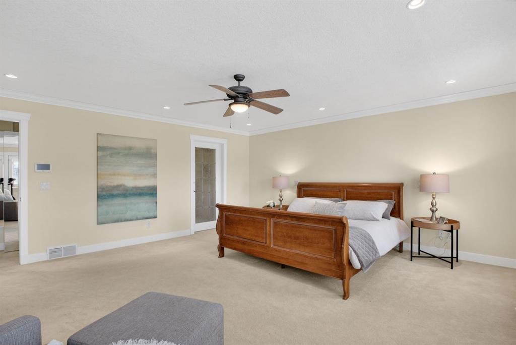 24 Ypres Mews Sw, Calgary, AB - Indoor Photo Showing Bedroom