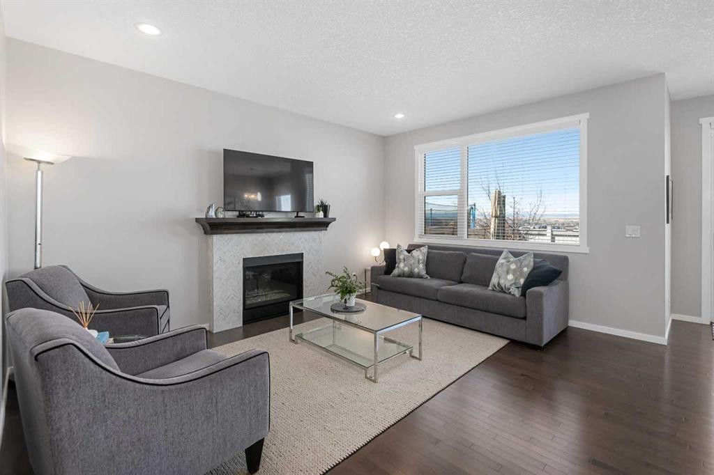 49 Tuscany Ridge Circle Nw, Calgary, AB - Indoor Photo Showing Living Room With Fireplace