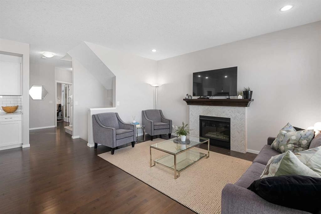 49 Tuscany Ridge Circle Nw, Calgary, AB - Indoor Photo Showing Living Room With Fireplace