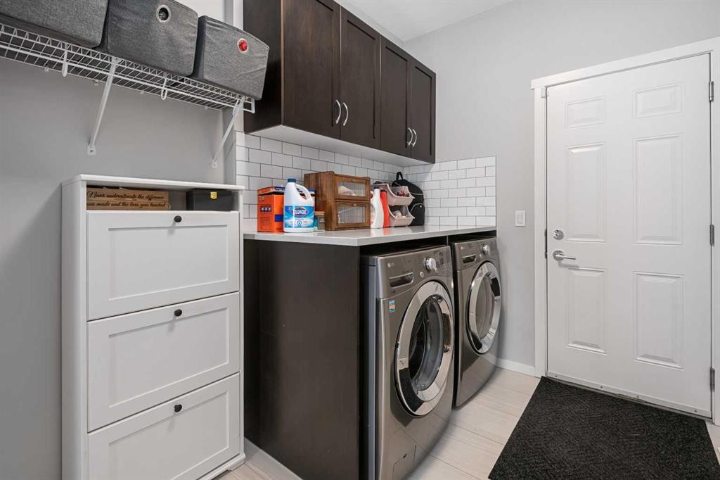 49 Tuscany Ridge Circle Nw, Calgary, AB - Indoor Photo Showing Laundry Room