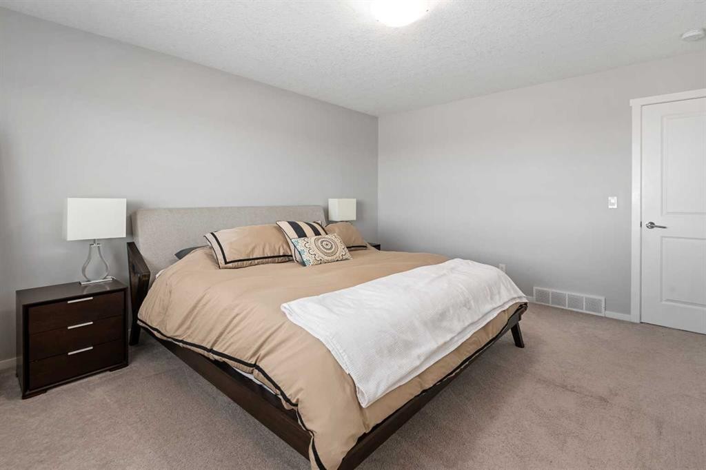 49 Tuscany Ridge Circle Nw, Calgary, AB - Indoor Photo Showing Bedroom
