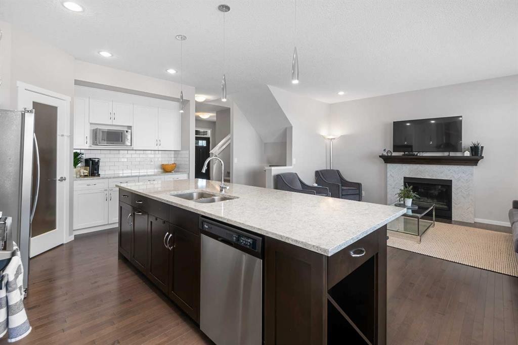 49 Tuscany Ridge Circle Nw, Calgary, AB - Indoor Photo Showing Kitchen With Stainless Steel Kitchen With Double Sink With Upgraded Kitchen