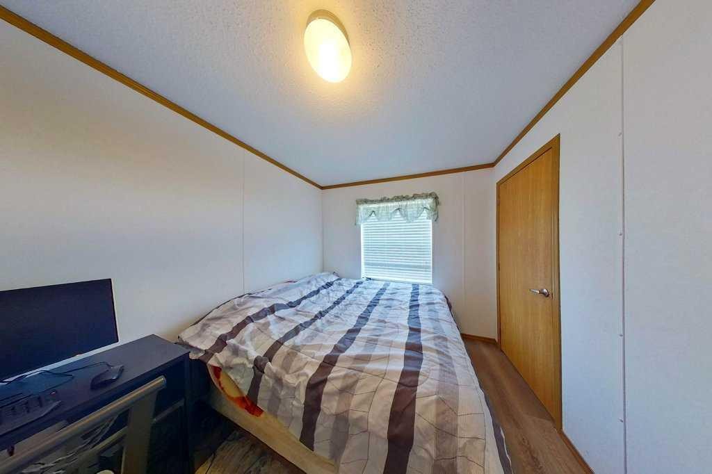 19 Noblefern Way, Sundre, AB - Indoor Photo Showing Bedroom
