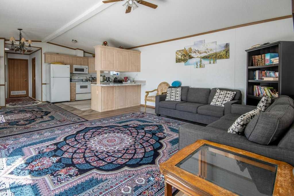 19 Noblefern Way, Sundre, AB - Indoor Photo Showing Living Room