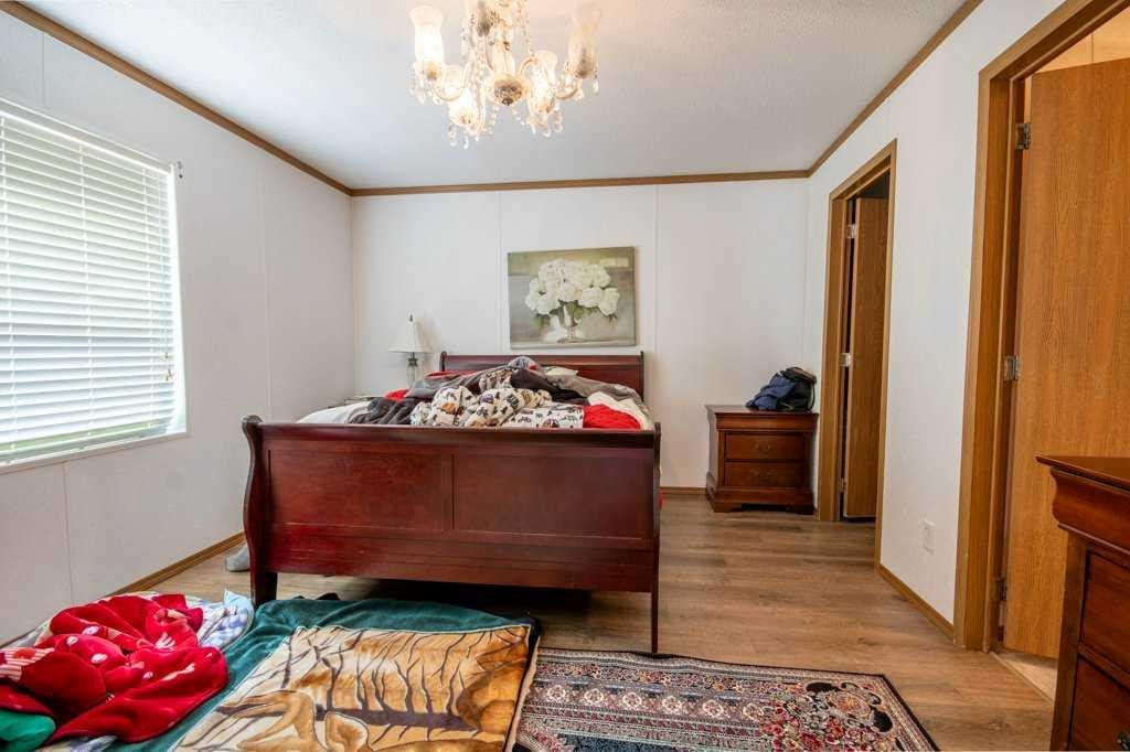 19 Noblefern Way, Sundre, AB - Indoor Photo Showing Bedroom