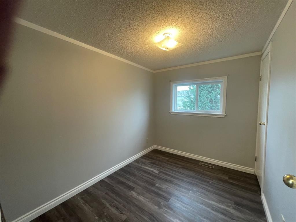 12 Westover Crescent, Claresholm, AB - Indoor Photo Showing Other Room