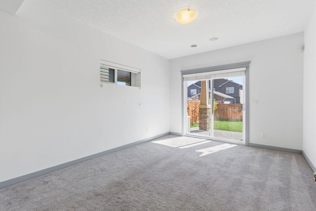 11 Evanscrest Way Nw, Calgary, AB - Indoor Photo Showing Other Room