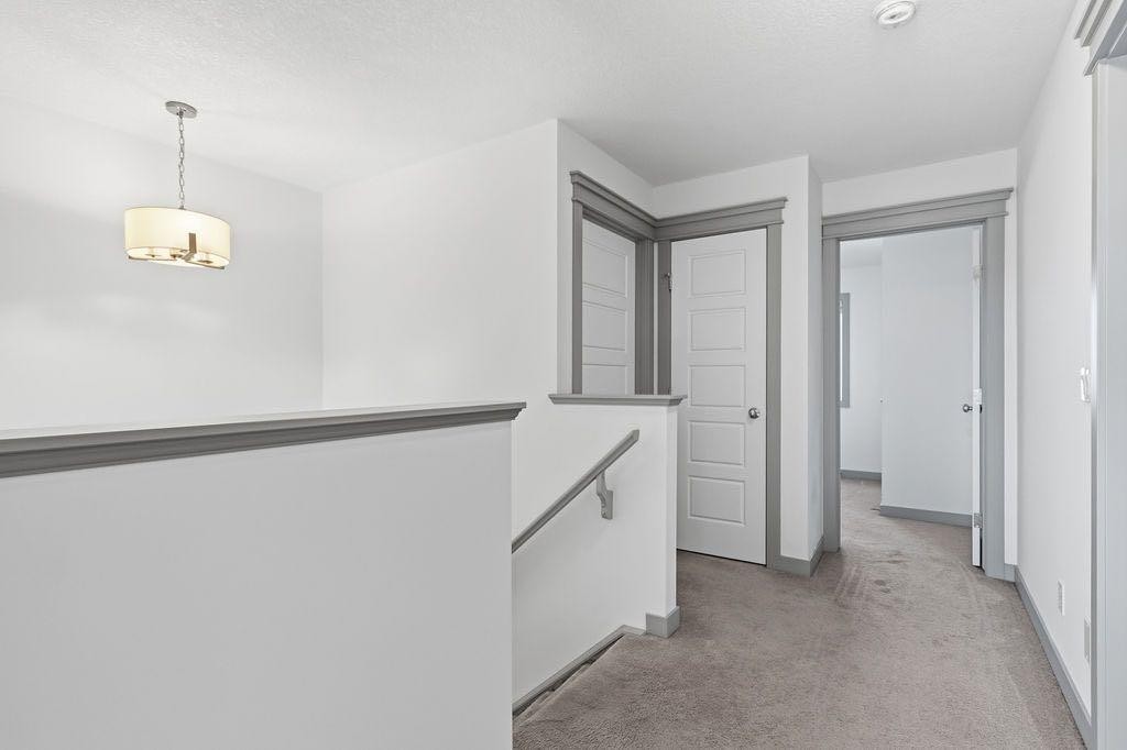 11 Evanscrest Way Nw, Calgary, AB - Indoor Photo Showing Other Room