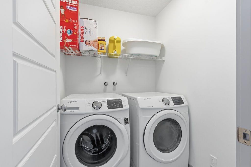 11 Evanscrest Way Nw, Calgary, AB - Indoor Photo Showing Laundry Room