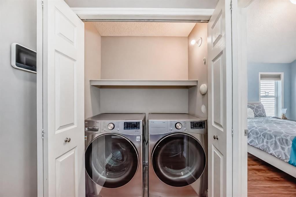 255 Copperfield Manor Se, Calgary, AB - Indoor Photo Showing Laundry Room