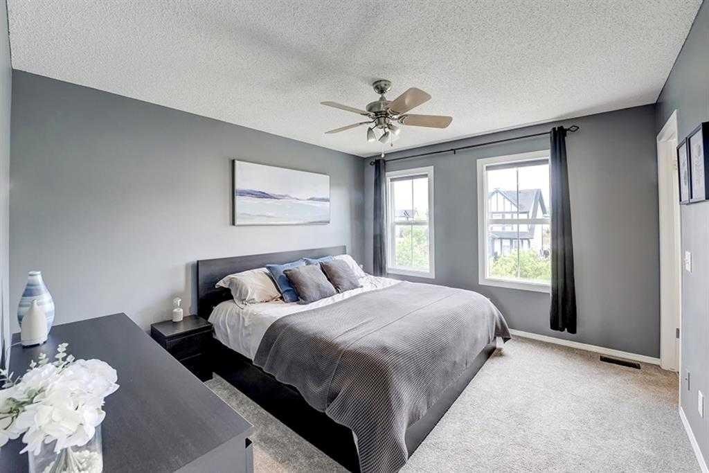 12 Elgin Meadows View Se, Calgary, AB - Indoor Photo Showing Bedroom