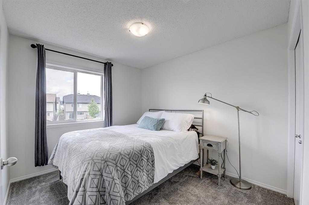 12 Elgin Meadows View Se, Calgary, AB - Indoor Photo Showing Bedroom