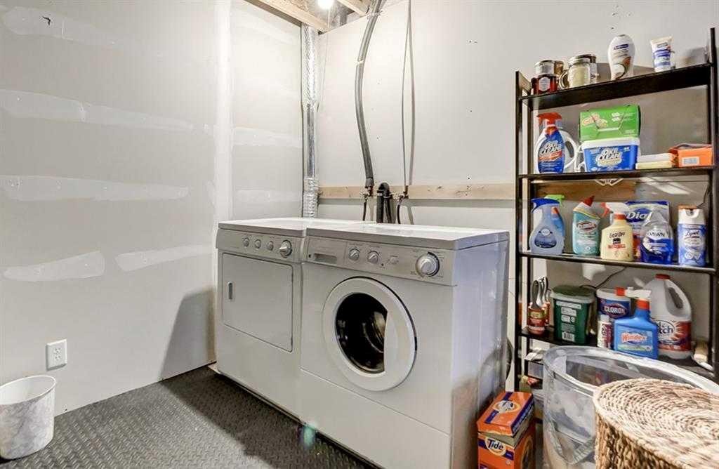 12 Elgin Meadows View Se, Calgary, AB - Indoor Photo Showing Laundry Room