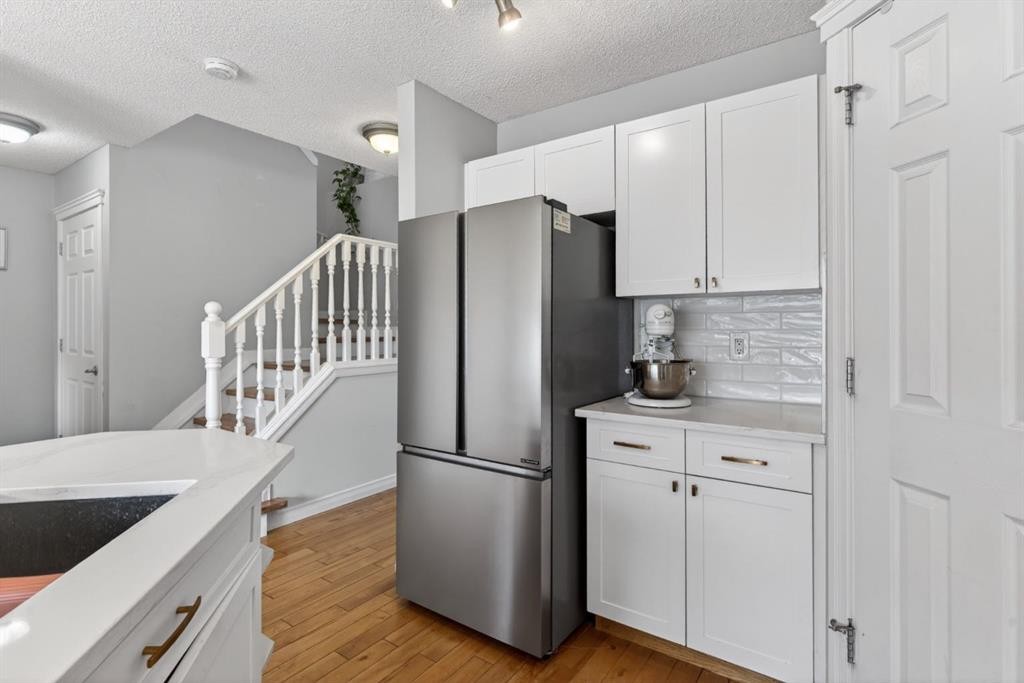 57 Bridlewood Manor Sw, Calgary, AB - Indoor Photo Showing Other Room