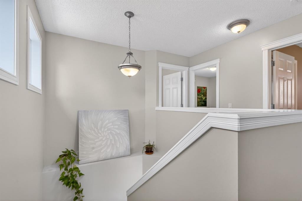 57 Bridlewood Manor Sw, Calgary, AB - Indoor Photo Showing Other Room