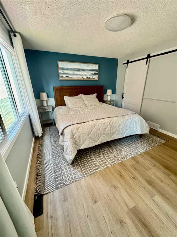 16 Woodfield Court Sw, Calgary, AB - Indoor Photo Showing Bedroom