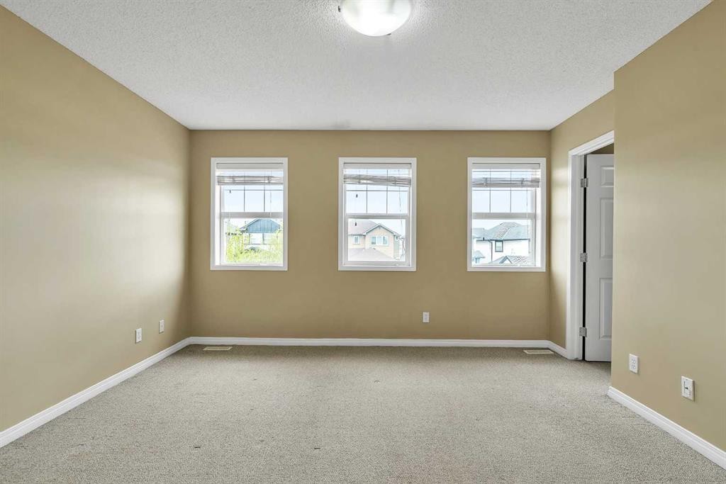247 Evermeadow Avenue Sw, Calgary, AB - Indoor Photo Showing Other Room