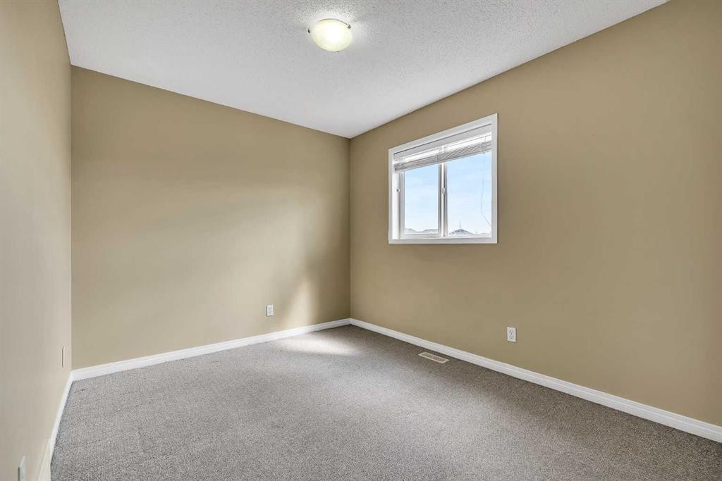 247 Evermeadow Avenue Sw, Calgary, AB - Indoor Photo Showing Other Room