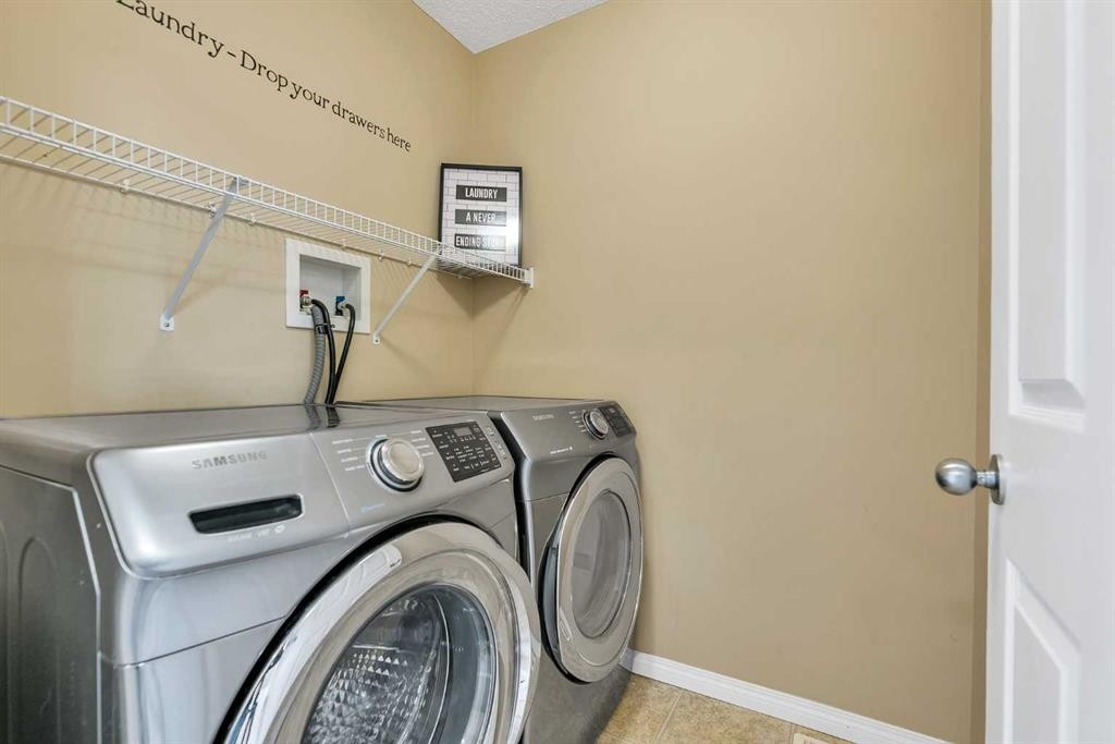 247 Evermeadow Avenue Sw, Calgary, AB - Indoor Photo Showing Laundry Room