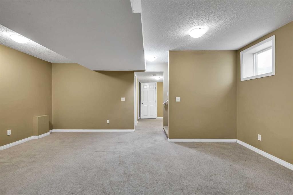 247 Evermeadow Avenue Sw, Calgary, AB - Indoor Photo Showing Other Room