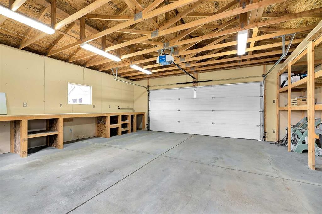 247 Evermeadow Avenue Sw, Calgary, AB - Indoor Photo Showing Garage