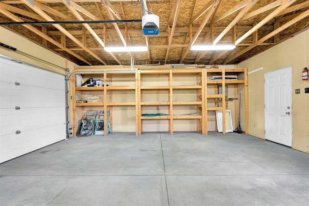 247 Evermeadow Avenue Sw, Calgary, AB - Indoor Photo Showing Garage