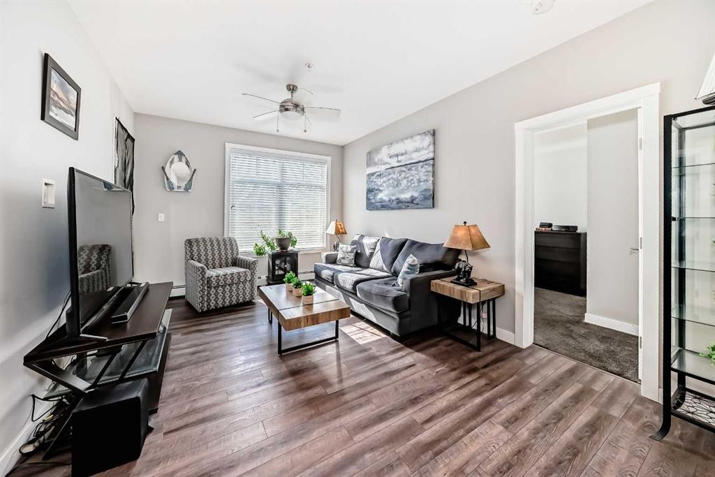 1212-3727 Sage Hill Drive Nw, Calgary, AB - Indoor Photo Showing Living Room