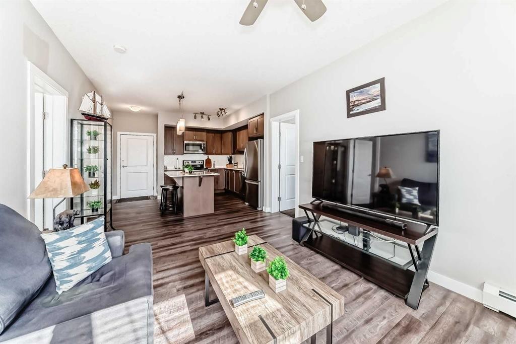 1212-3727 Sage Hill Drive Nw, Calgary, AB - Indoor Photo Showing Living Room
