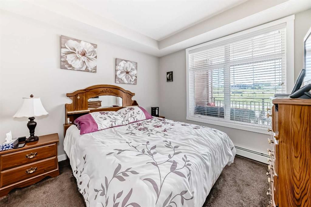 1212-3727 Sage Hill Drive Nw, Calgary, AB - Indoor Photo Showing Bedroom