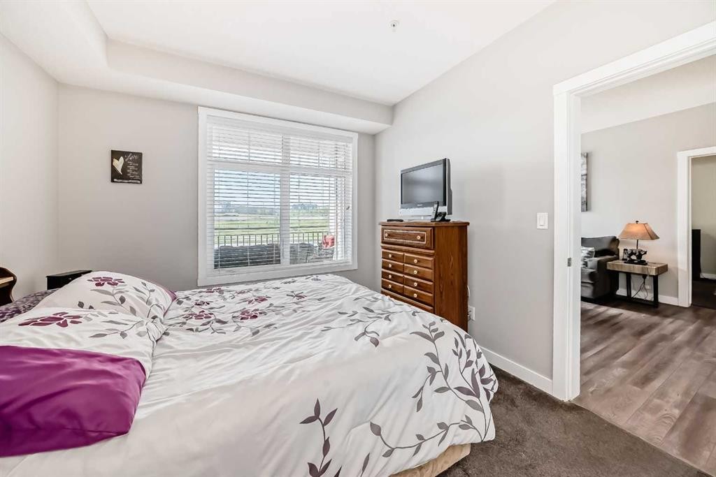 1212-3727 Sage Hill Drive Nw, Calgary, AB - Indoor Photo Showing Bedroom