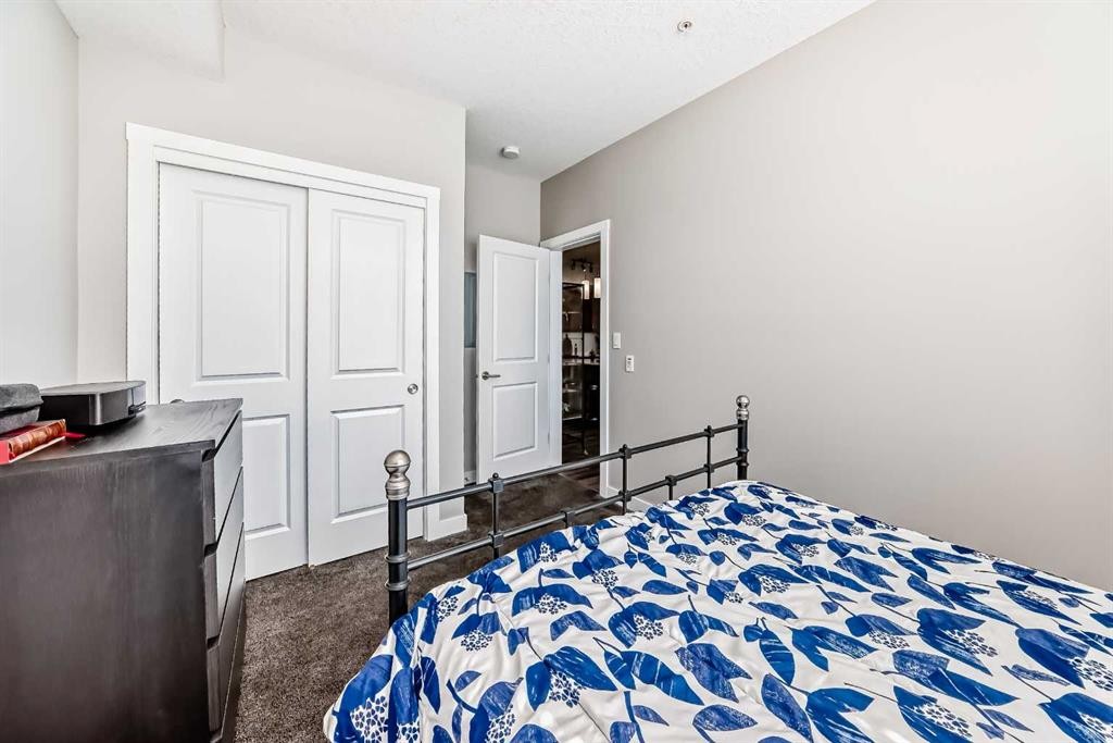 1212-3727 Sage Hill Drive Nw, Calgary, AB - Indoor Photo Showing Bedroom
