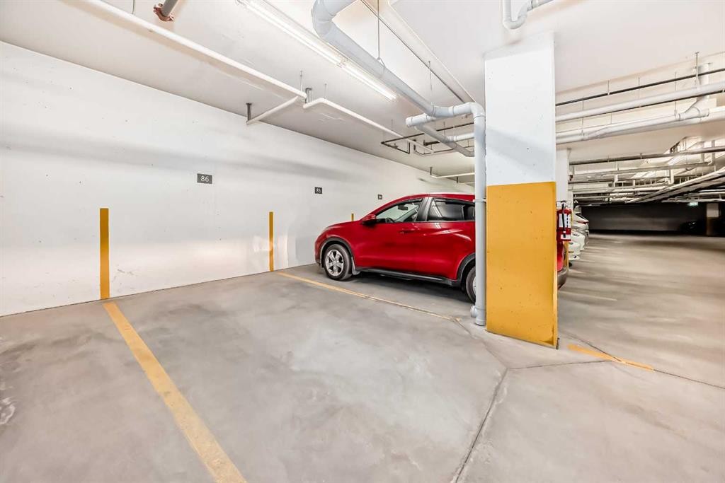 1212-3727 Sage Hill Drive Nw, Calgary, AB - Indoor Photo Showing Garage