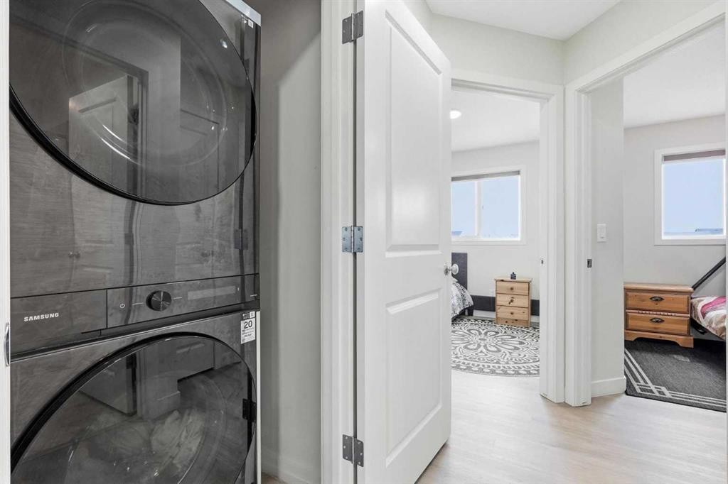 1612 Rangeview Drive Se, Calgary, AB - Indoor Photo Showing Laundry Room