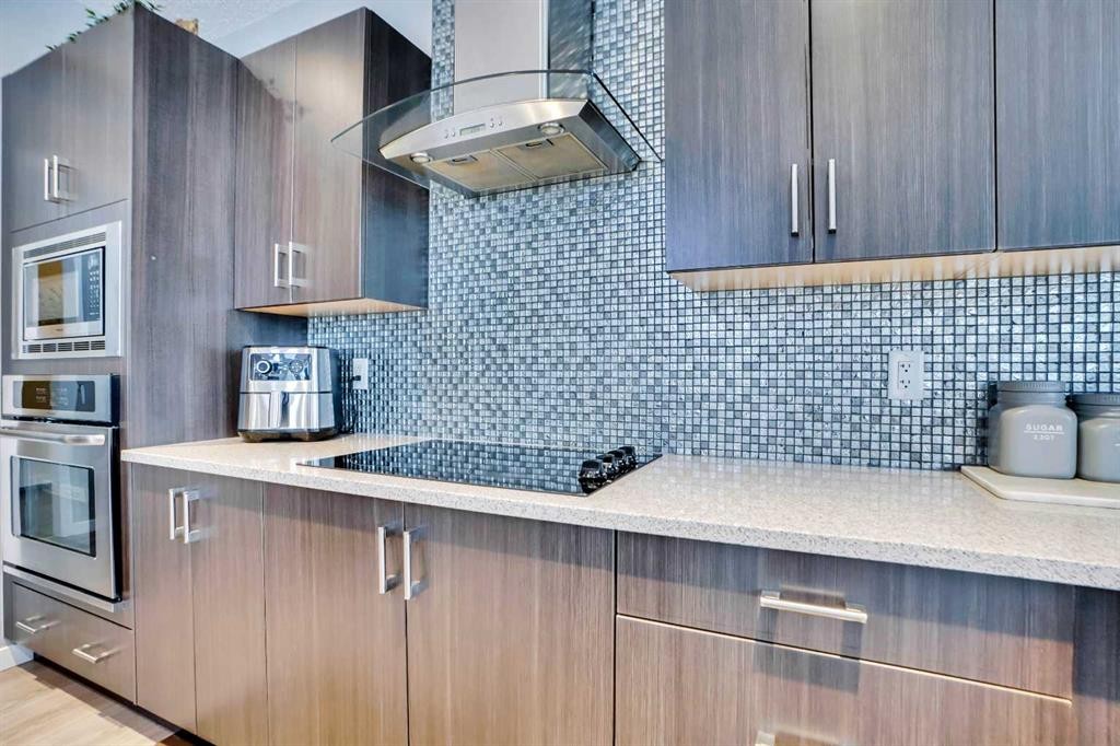 100 Redstone Parade Ne, Calgary, AB - Indoor Photo Showing Kitchen With Upgraded Kitchen