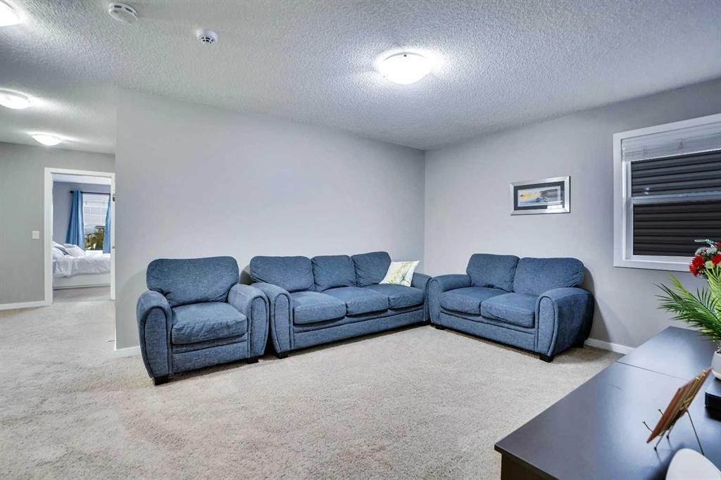 100 Redstone Parade Ne, Calgary, AB - Indoor Photo Showing Living Room