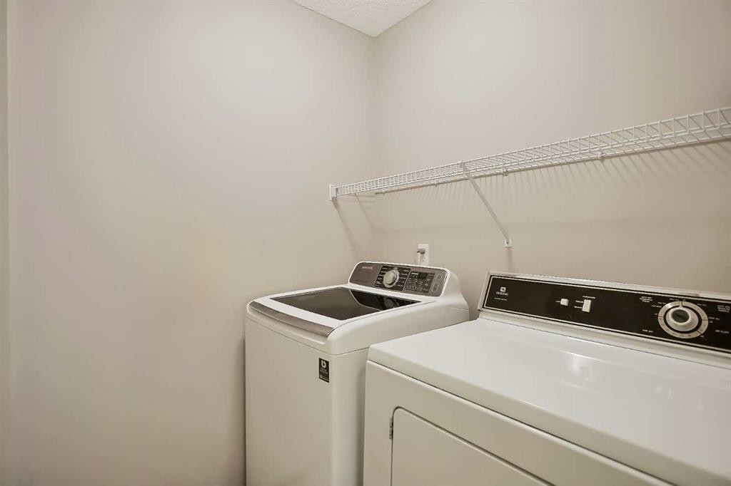 78 Hamptons Link Nw, Calgary, AB - Indoor Photo Showing Laundry Room