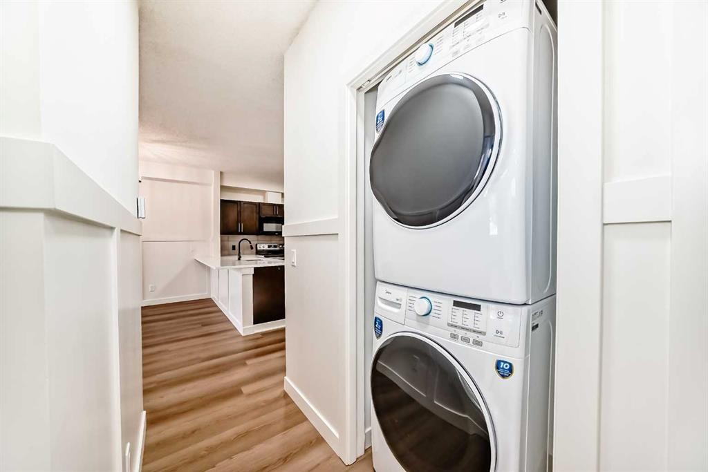 101-22 Panatella Road Nw, Calgary, AB - Indoor Photo Showing Laundry Room