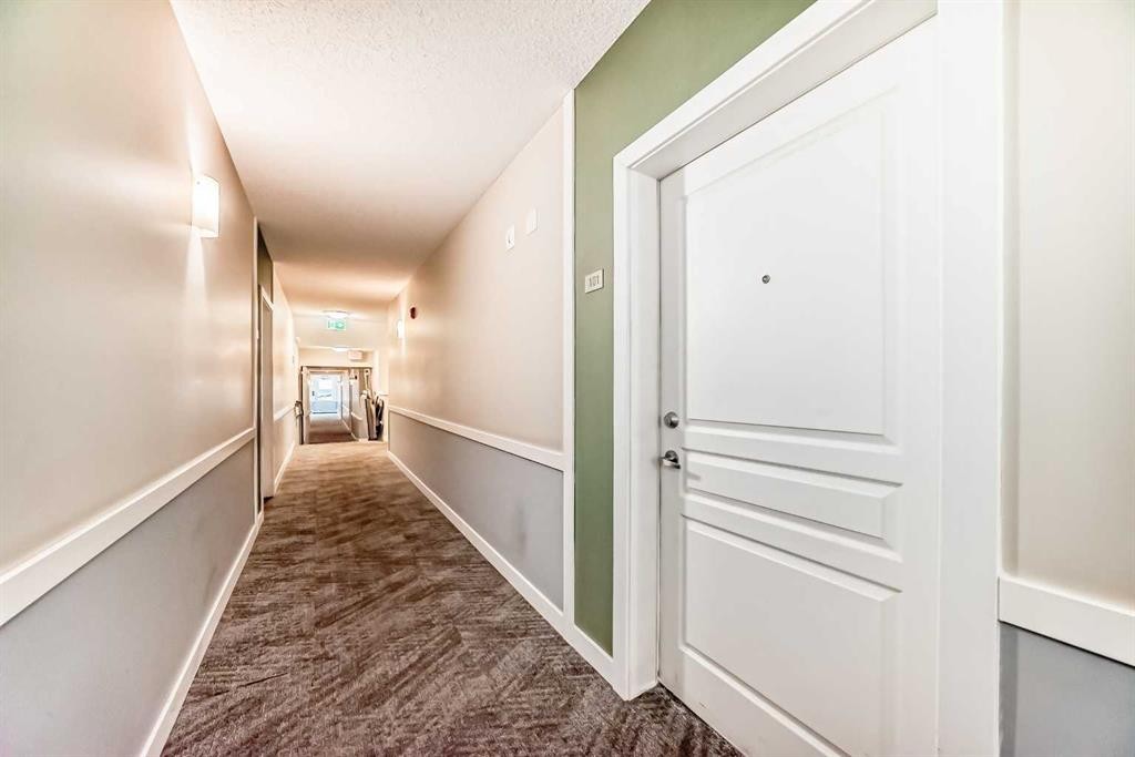 101-22 Panatella Road Nw, Calgary, AB - Indoor Photo Showing Other Room