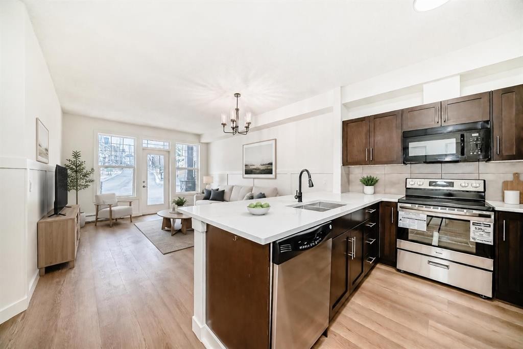 101-22 Panatella Road Nw, Calgary, AB - Indoor Photo Showing Kitchen