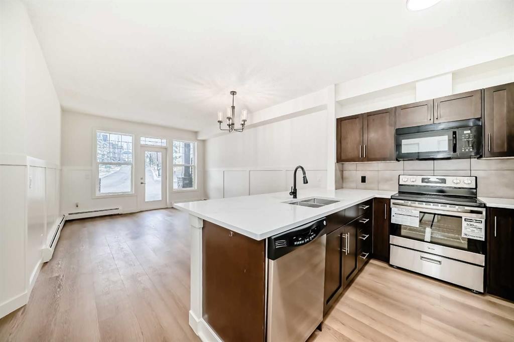 101-22 Panatella Road Nw, Calgary, AB - Indoor Photo Showing Kitchen