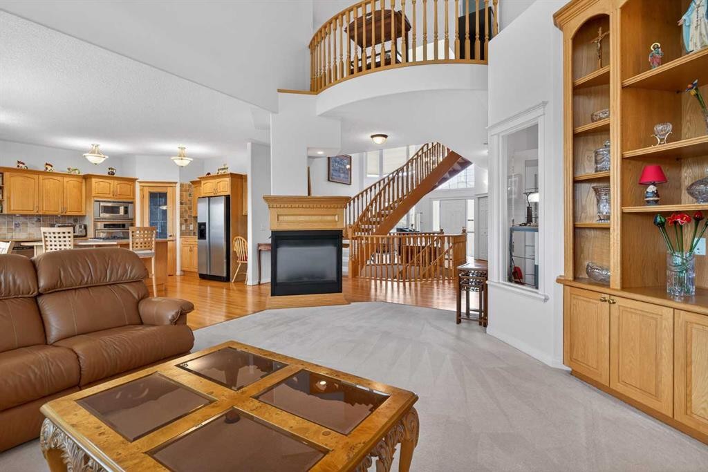 307 Hampstead Way Nw, Calgary, AB - Indoor Photo Showing Living Room With Fireplace