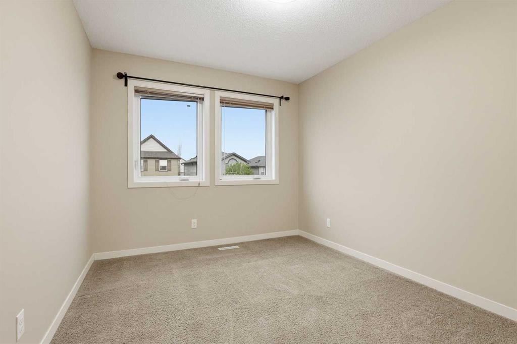 37 Nolanfield Manor Nw, Calgary, AB - Indoor Photo Showing Other Room