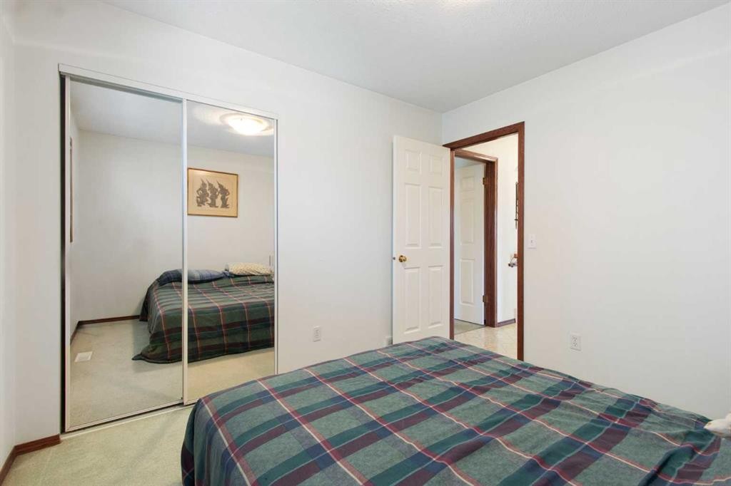 2 Madison Court, Strathmore, AB - Indoor Photo Showing Bedroom